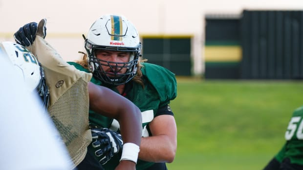 Offensive lineman James Durand of Basha High School blocking.